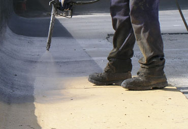 coating systems over Norman spray foam roof systems